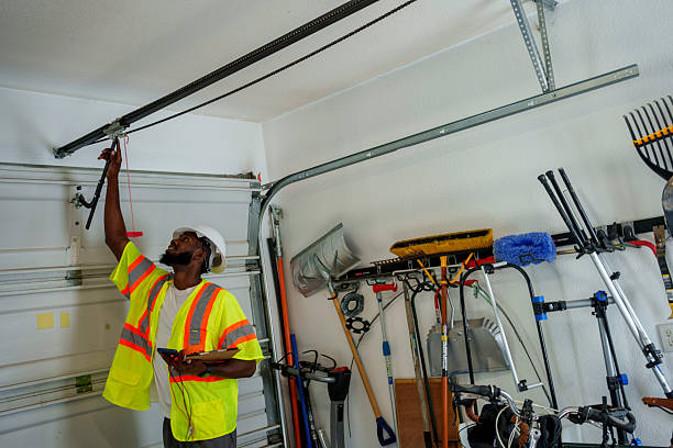 Professional Garage Door Panel Replacement technician working in Jarales, NM